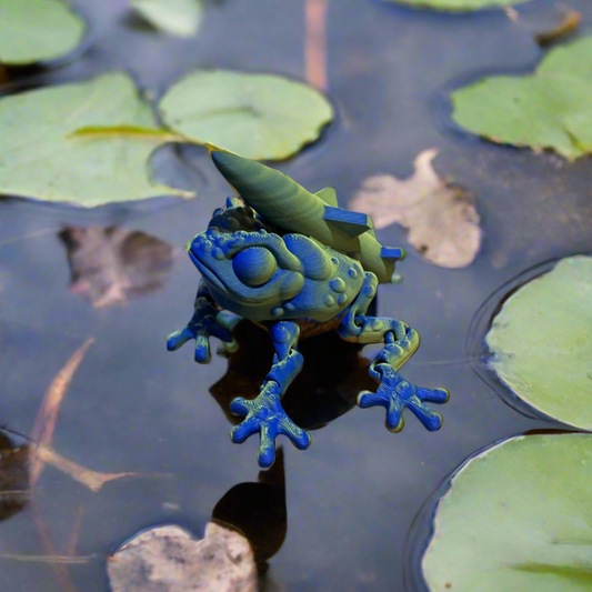 Missile Toad 3D print in blue and green with a leaf on its back.