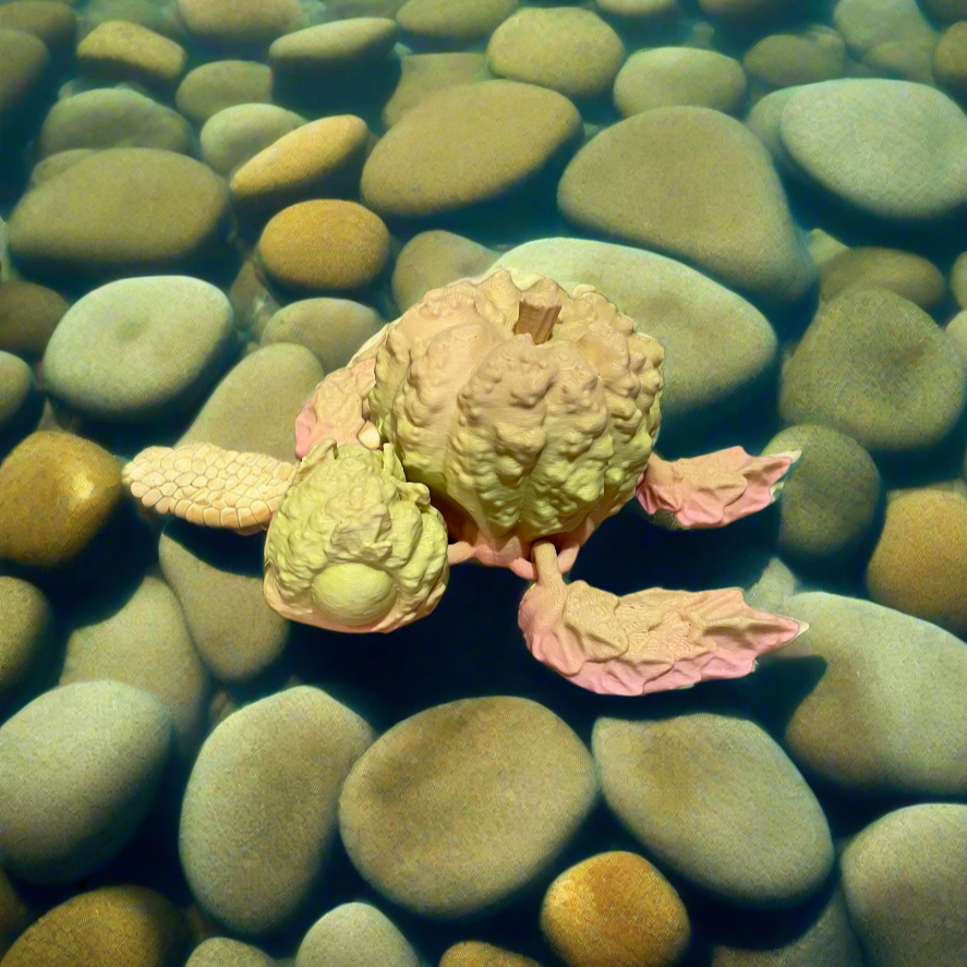 Pumpkin turtle 3D print in yellow and pink with detailed shell design.